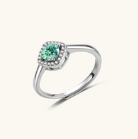 Product video showcasing GRA Certified Green Moissanite Diamond Emerald Glow Halo Ring with a brilliant green moissanite center stone and sparkling halo details | Olaty