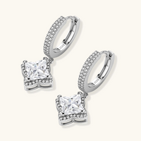 Product video showcasing GRA Certified Moissanite Diamond Dangle Huggies with brilliant moissanite stones, sparkling dangle details and elegant huggie hoop design | Olaty