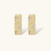 Product video showcasing Clover Bloom Zirconia Hoop Earrings with sparkling zirconia details, clover-inspired floral accents and an elegant hoop design | Olaty