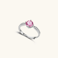 Product video showcasing GRA Certified Pink Moissanite Diamond Pink Dreams Ring with a brilliant pink moissanite center stone and sparkling accent details | Olaty