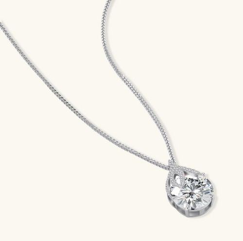 Product video showcasing GRA Certified Moissanite Diamond Teardrop Brilliance Pendant Necklace with a brilliant teardrop-shaped moissanite stone and sparkling pendant details | Olaty