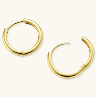 Product video showcasing Golden Hour Hoops with a polished gold-tone finish and elegant sculptural hoop design | Olaty