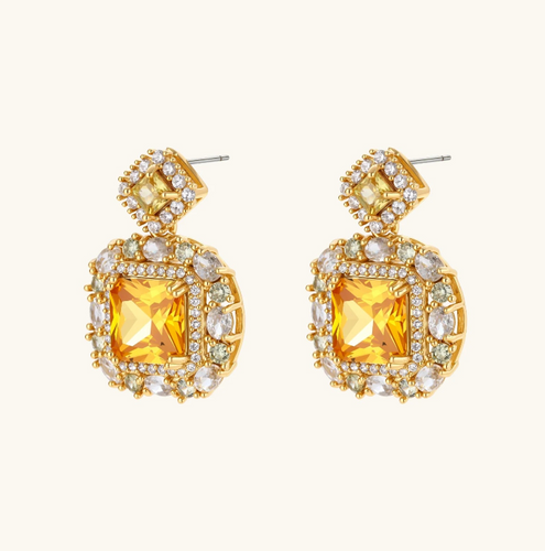 Product video showcasing Golden Square Zirconia Statement Necklace & Earrings Set with sparkling square zirconia details, bold geometric design and coordinated statement necklace and earrings | Olaty