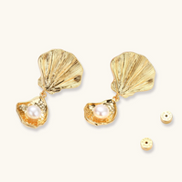 Product video showcasing Ocean Shell Pearl Drop Earrings with luminous shell details, lustrous pearl drops and an elegant ocean-inspired design | Olaty