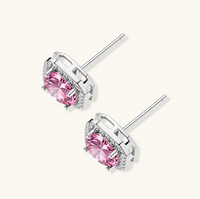 Product video showcasing GRA Certified Pink Moissanite Diamond Blush Halo Stud Earrings with brilliant pink moissanite center stones and sparkling halo details | Olaty