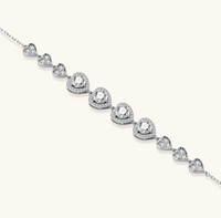 Product video showcasing GRA Certified Moissanite Diamond Heart Symphony Jewelry Set with brilliant moissanite stones, sparkling heart-inspired details and coordinated jewelry pieces | Olaty
