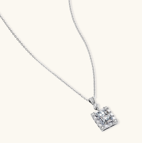 Product video showcasing GRA Certified Moissanite Diamond Geometric Halo Pendant Necklace with a brilliant moissanite center stone, sparkling halo details and geometric pendant design | Olaty