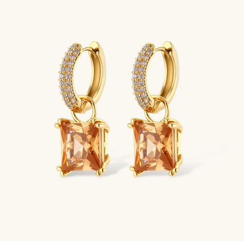 Product video showcasing Champagne Zirconia Geometric Jewelry Set with sparkling champagne zirconia stones, geometric details and coordinated jewelry pieces | Olaty