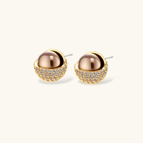 Product video showcasing Solar Sphere Necklace & Statement Stud Earrings Set with sculptural sphere details and coordinated necklace and statement stud earrings | Olaty