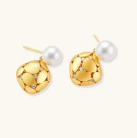 Product video showcasing Petal Drop Pearl Earrings with lustrous pearl drops and elegant petal-inspired sculptural details | Olaty