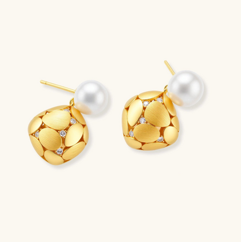 Product video showcasing Petal Drop Pearl Earrings with lustrous pearl drops and elegant petal-inspired sculptural details | Olaty
