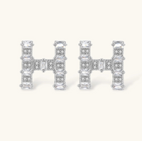 Product video showcasing H Initial Zirconia Necklace & Stud Earrings Set with sparkling zirconia details, H initial design and coordinated necklace and stud earrings | Olaty