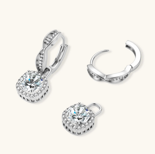 Product video showcasing GRA Certified 1 CT VVS1 Moissanite Diamond Halo Drop Earrings in 925 Sterling Silver with brilliant moissanite center stones and sparkling halo drop details | Olaty