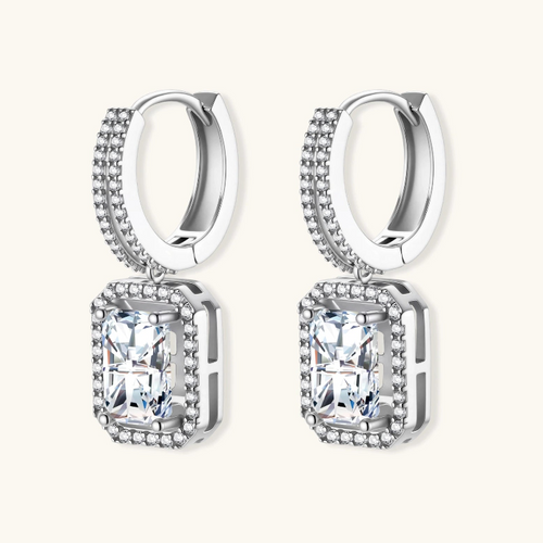 Product video showcasing GRA Certified Moissanite Diamond Emerald Cut Drop Earrings with brilliant emerald-cut moissanite stones and sparkling drop details | Olaty