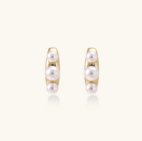 Product video showcasing Pearl Trio Curve Stud Earrings with three lustrous pearl accents arranged along an elegant curved stud design | Olaty