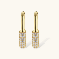 Product video showcasing Golden Glow Zirconia Huggie Hoop Earrings with sparkling zirconia details and a polished gold-tone huggie hoop design | Olaty