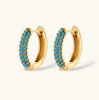 Product video showcasing Turquoise Curve Necklace & Huggie Hoop Earrings Set with vibrant turquoise details, sculptural curved design and coordinated necklace and huggie hoop earrings | Olaty