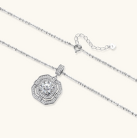 Product video showcasing GRA Certified Moissanite Diamond Geometric Halo Necklace with a brilliant moissanite center stone, sparkling halo details and geometric pendant design | Olaty