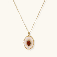 Product video showcasing Amber Cameo Statement Pendant Necklace with warm amber tones, ornate cameo-inspired detailing and a gold-tone chain | Olaty