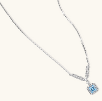 Product video showcasing GRA Certified Blue Moissanite Diamond Celestial Arc Necklace with brilliant blue moissanite stones and sparkling celestial arc-inspired pendant details | Olaty