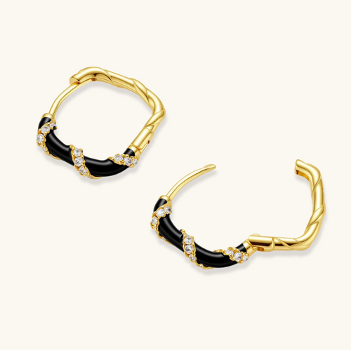 Product video showcasing Midnight Stripe Hoops with bold striped details and a modern sculptural hoop design | Olaty