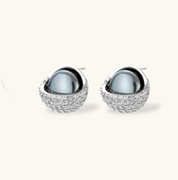 Product video showcasing Cosmic Sphere Zirconia Necklace & Stud Earrings Set with sparkling zirconia sphere details and coordinated necklace and stud earrings | Olaty