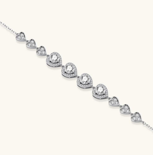 Product video showcasing GRA Certified Moissanite Diamond Hearts Bracelet with brilliant moissanite stones and sparkling heart-inspired details | Olaty