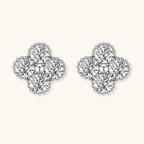 Product video showcasing GRA Certified Moissanite Diamond Quatrefoil Stud Earrings with brilliant moissanite stones and sparkling quatrefoil-inspired details | Olaty