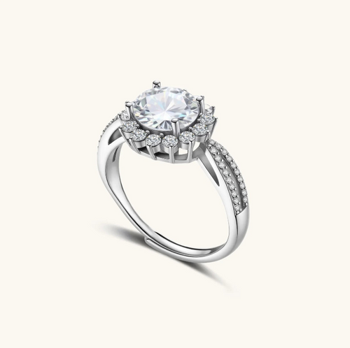 Product video showcasing GRA Certified Moissanite Diamond Stellar Halo Ring with a brilliant moissanite center stone and sparkling stellar halo details | Olaty
