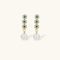 Product video showcasing Emerald Garden Floral Zirconia Necklace & Pearl Drop Earrings Set with emerald green zirconia floral details, lustrous pearl drops and coordinated necklace and earrings | Olaty