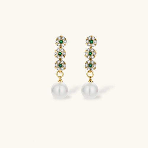 Product video showcasing Emerald Garden Floral Zirconia Necklace & Pearl Drop Earrings Set with emerald green zirconia floral details, lustrous pearl drops and coordinated necklace and earrings | Olaty