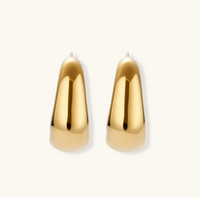 Product video showcasing Sculpted Curve Gold Huggie Earrings with smooth sculptural curves and a polished gold-tone huggie design | Olaty