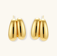 Product video showcasing Liquid Gold Sculptural Hoops with fluid curved forms and a polished gold-tone sculptural hoop design | Olaty