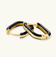 Product video showcasing Contrast Hoop Earrings with bold contrasting details and a modern sculptural hoop design | Olaty