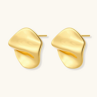 Product video showcasing Flow Sculpted Statement Stud Earrings with fluid sculptural curves and a bold statement design | Olaty